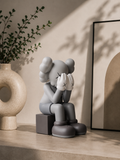 Figurine de collection assise